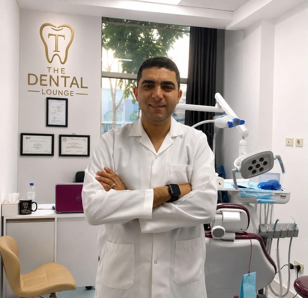 Dr. Karim Elshibiny standing inside The Dental Lounge clinic